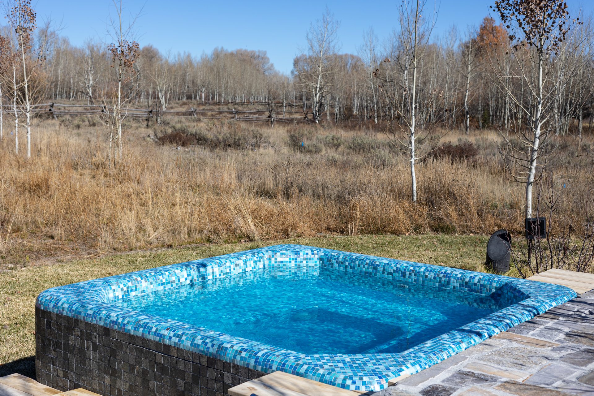 NESPA spa finished in glass mosaic